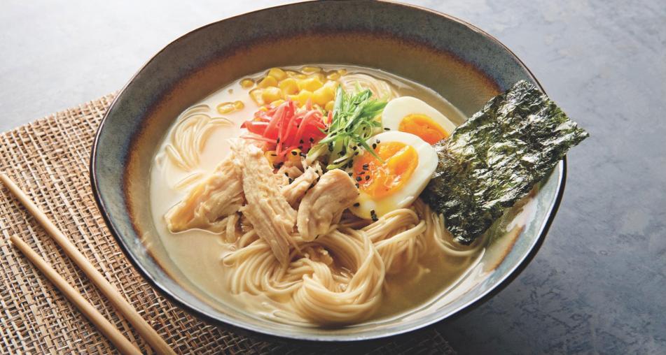 A bowl of Chicken Ramen with egg and nori sheet