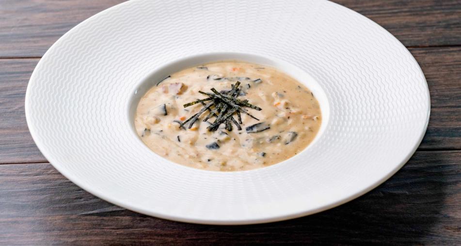 A bowl of vegetable ocean chowder