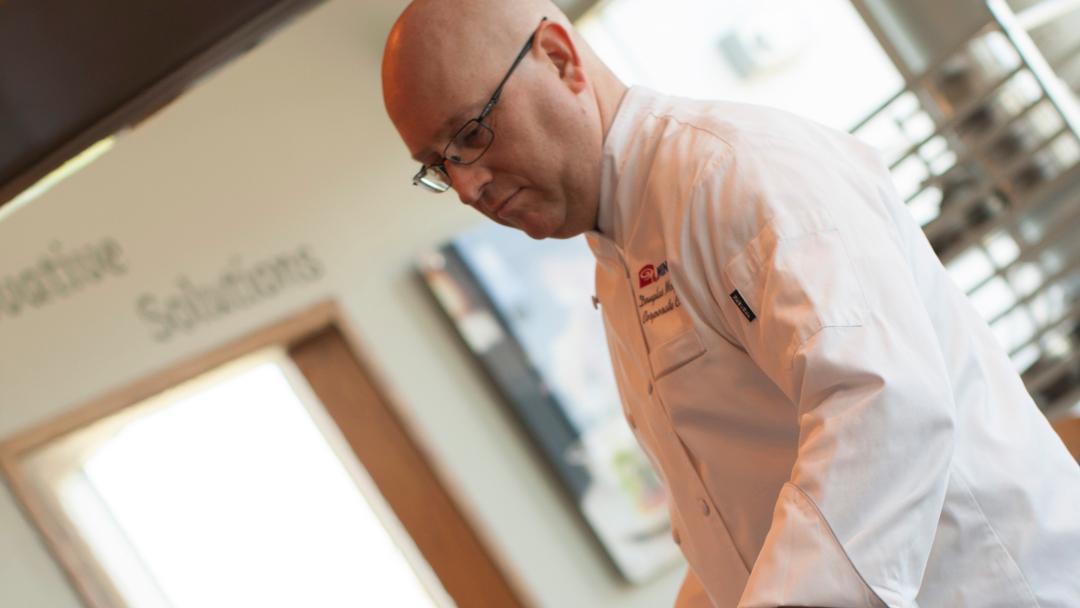 Chef Doug McGohan working in the kitchen