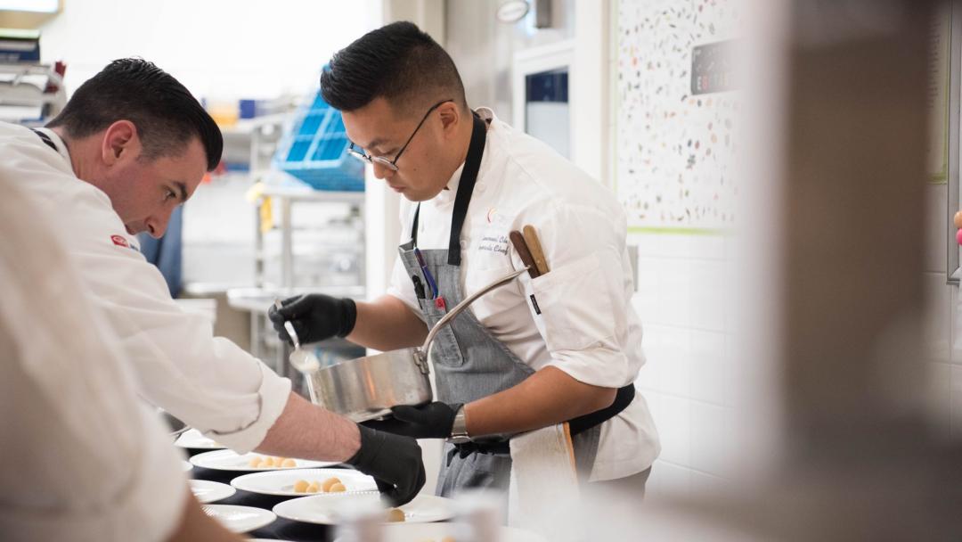 Chef Emmanuel Oh working in the kitchen