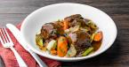 Sunday Pot Roast in a dish with napkin and silverware